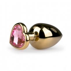 Gold colored anal plug with decorative stone in heart shape