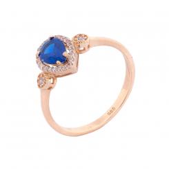 Ladies' ring in 585 rose gold with blue sapphire and colorless zirconia