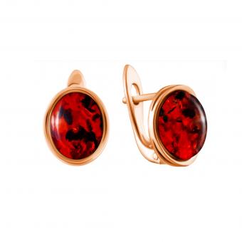 Earrings in 925 sterling silver with oval red amber