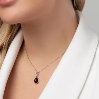 Pendant in 925 sterling silver with oval red amber